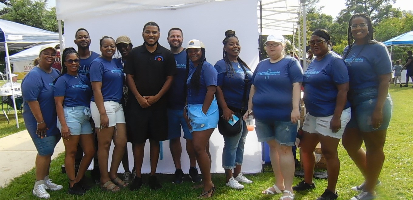 CBHS team members taking a picture with the mayor.